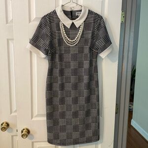 Black and white corporate dress.